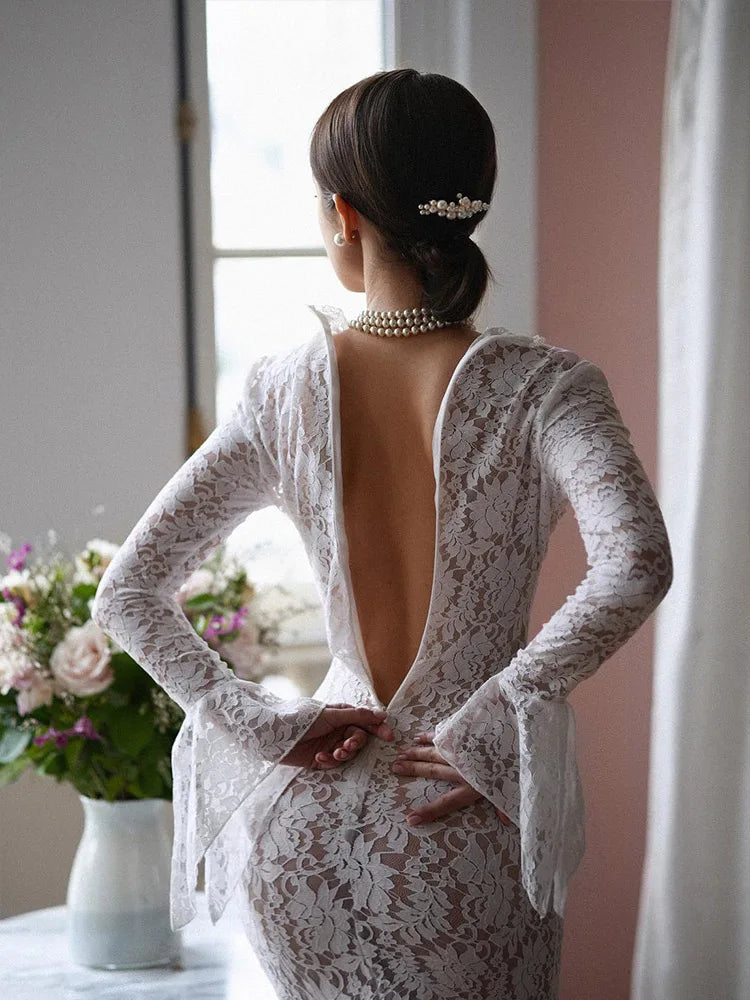 Robe en dentelle manches longues très chic